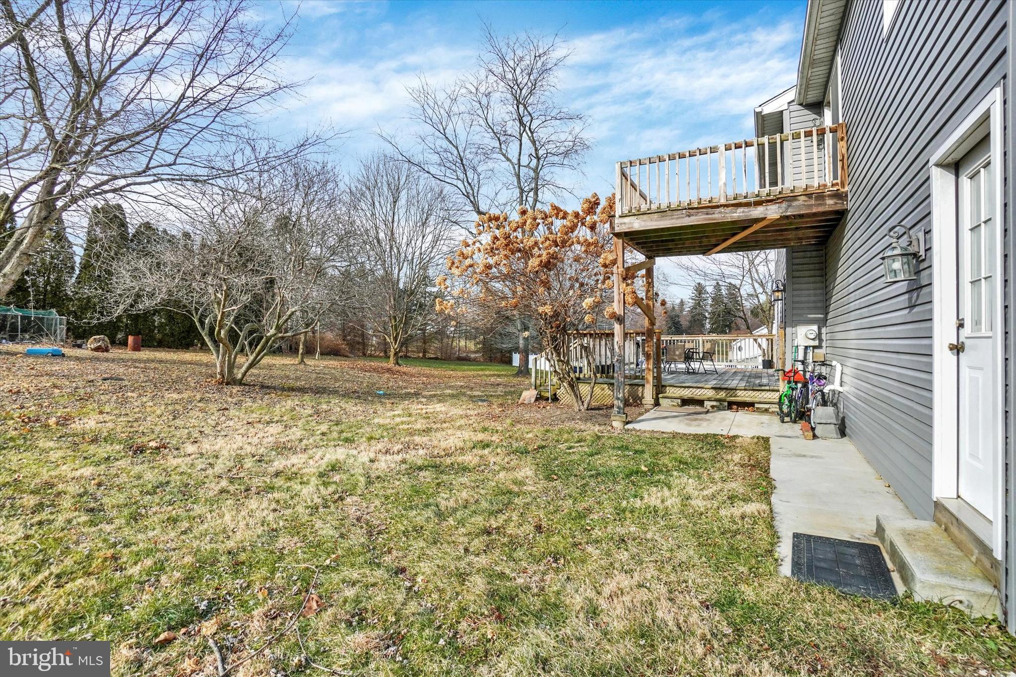 3 Harrison Road New Freedom, PA 17349 - Photo 26 of 28 a backyard of apartments with large trees