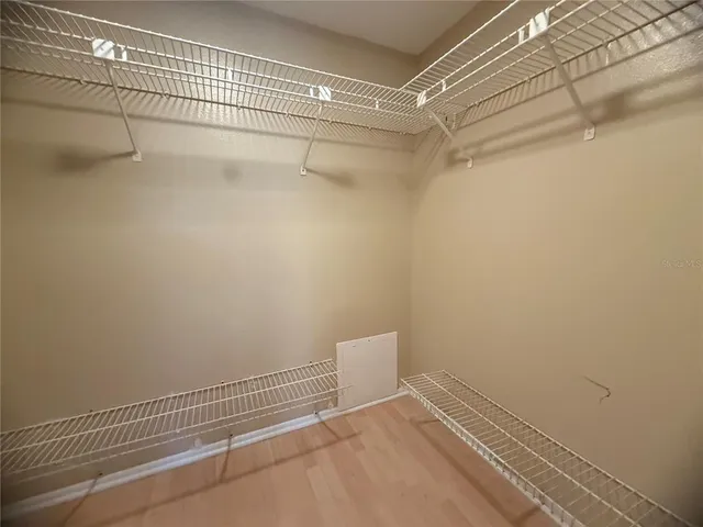 a view of a room with racks on the wall