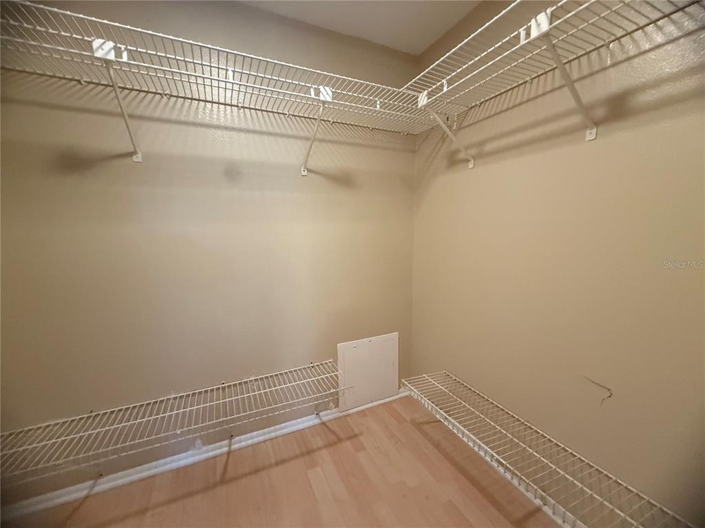 208 Palmetto Court, Unit 208 Oldsmar, FL 34677 - Photo 18 of 48 a view of a room with racks on the wall