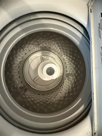 a view of a patio with swimming pool