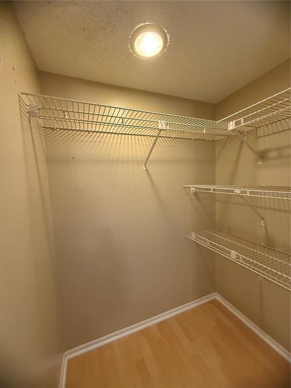 208 Palmetto Court, Unit 208 Oldsmar, FL 34677 - Photo 38 of 48 a view of a room with racks on the wall