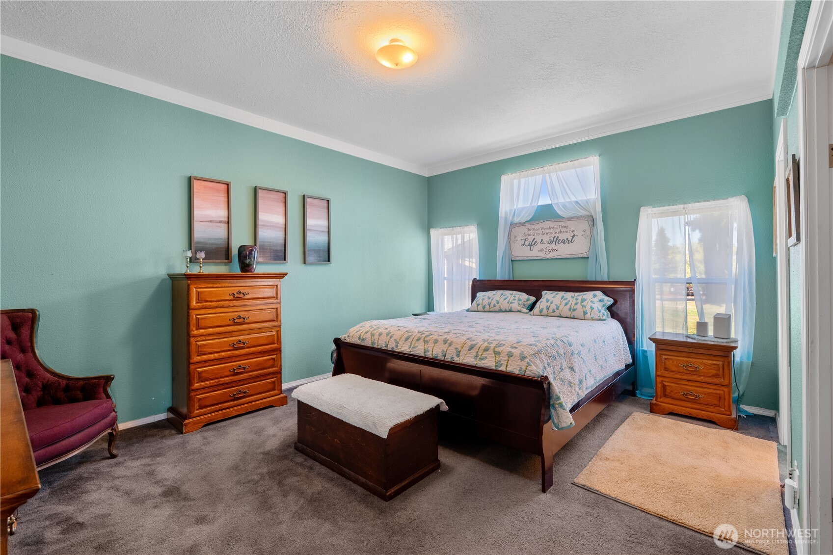 16742 Sheldon Lane Southwest Rochester, WA 98579 - Photo 15 of 40 a bedroom with a bed and a dresser
