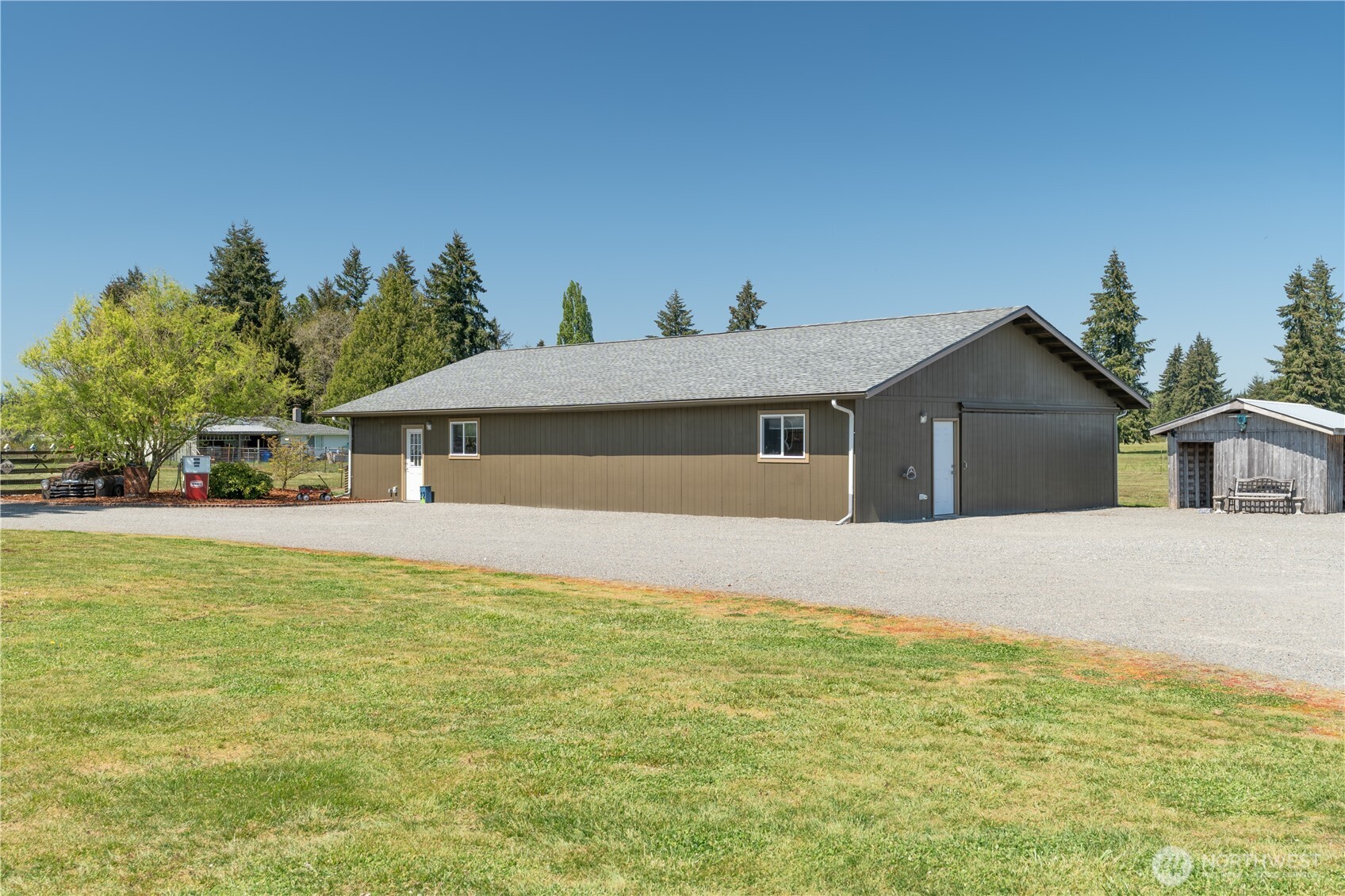 16742 Sheldon Lane Southwest Rochester, WA 98579 - Photo 28 of 40 a front view of a house with a yard