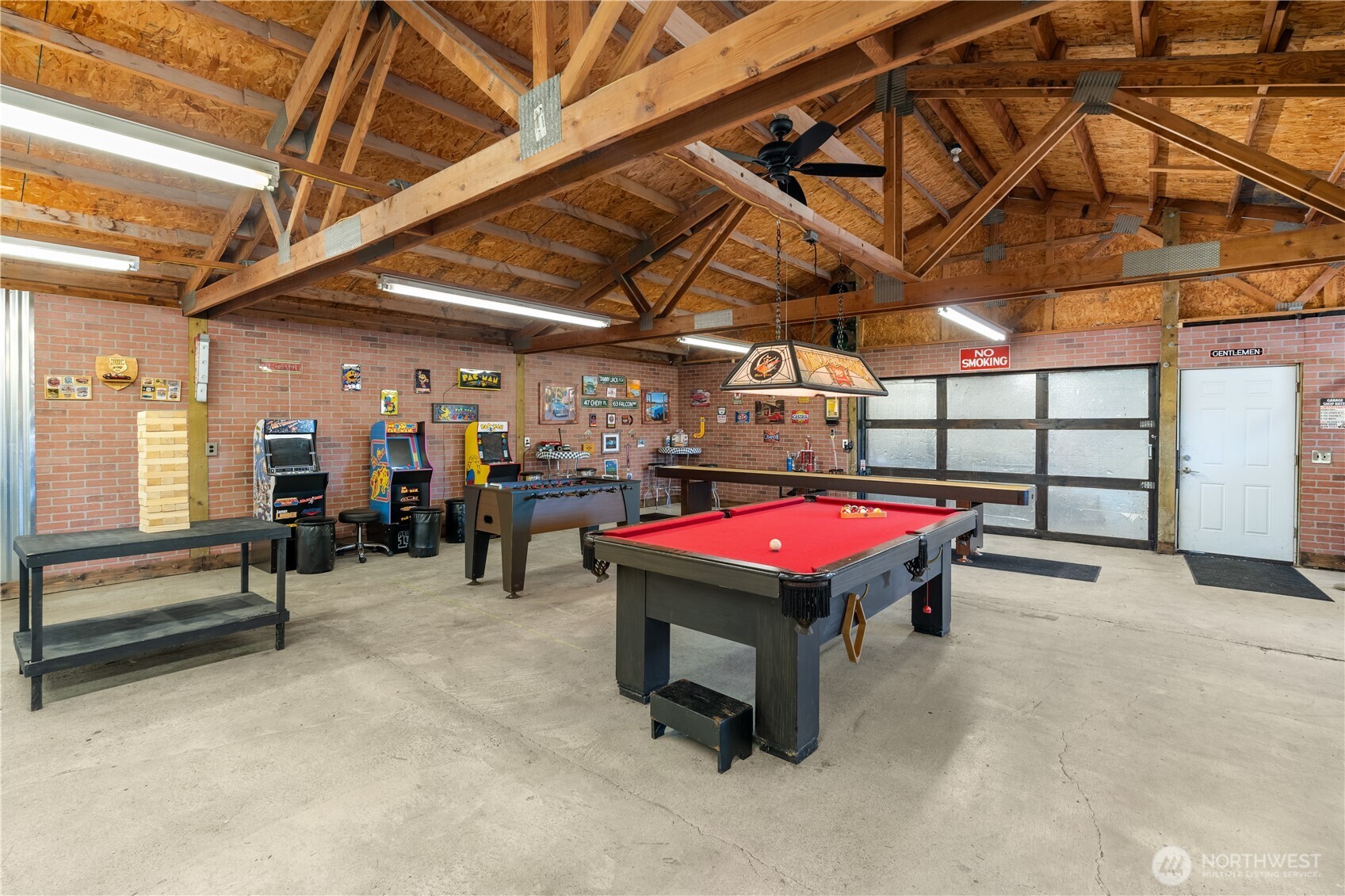 16742 Sheldon Lane Southwest Rochester, WA 98579 - Photo 35 of 40 a room with pool table and windows