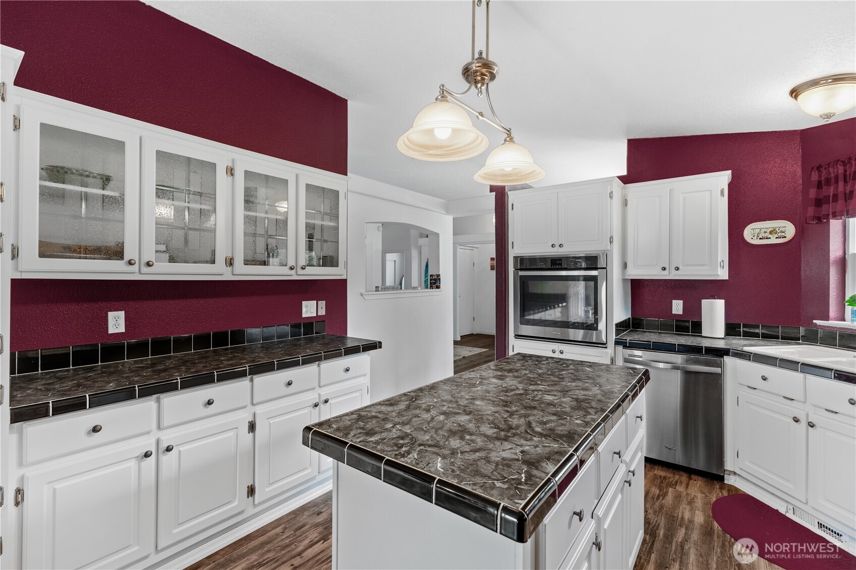 16742 Sheldon Lane Southwest Rochester, WA 98579 - Photo 6 of 40 a kitchen with stainless steel appliances granite countertop a stove and cabinets