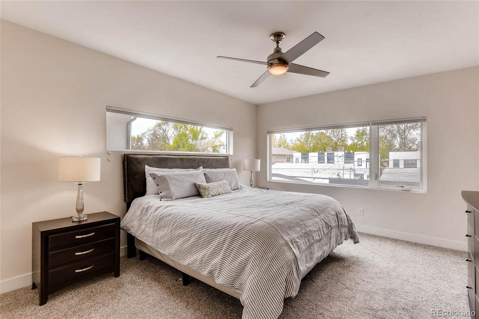 3957 Utica Street Denver, CO 80212 - Photo 10 of 28 a bedroom with a bed and window
