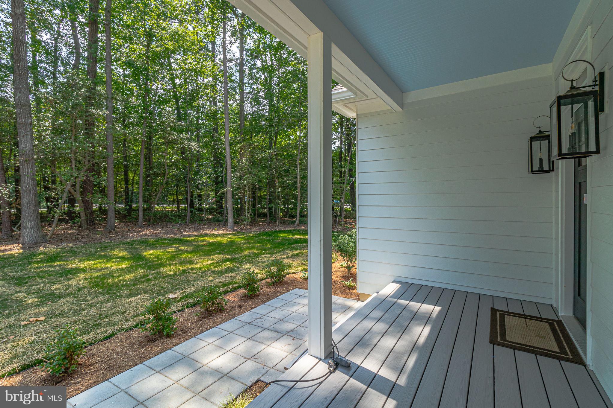 57 Waterman's Way Reedville, VA 22539 - Photo 38 of 43 Full front sitting porch. Home on sewer, no septic