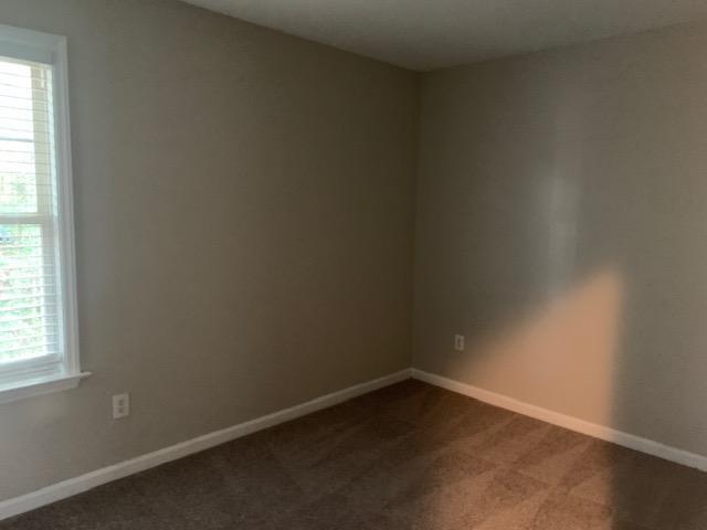 8320 Hobhouse Circle Raleigh, NC 27615 - Photo 9 of 16 an empty room with a window