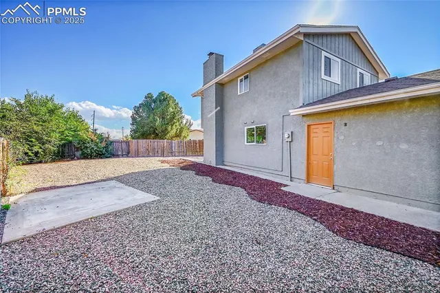 a view of backyard of house