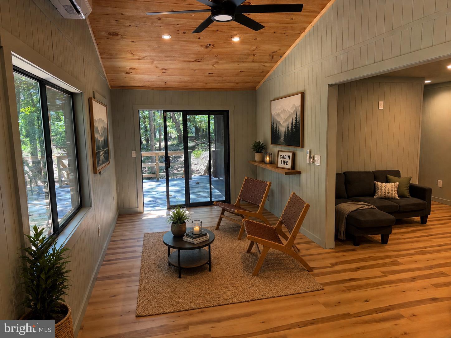 689 Snider's Ridge Mathias, WV 26812 - Photo 31 of 104 Great Room AI staged sitting area