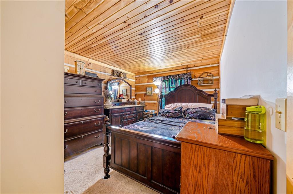 183 Chestnut Ridge Road Acme, PA 15610 - Photo 13 of 29 a view of bedroom with a bed and furniture