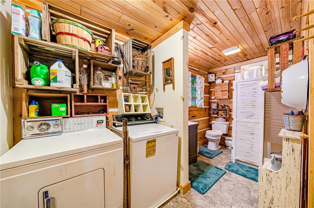 183 Chestnut Ridge Road Acme, PA 15610 - Photo 16 of 29 a utility room with dryer and washer