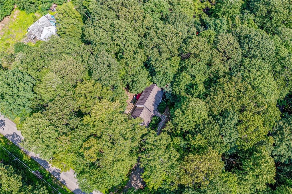 183 Chestnut Ridge Road Acme, PA 15610 - Photo 3 of 29 a aerial view of a house with a yard and garden
