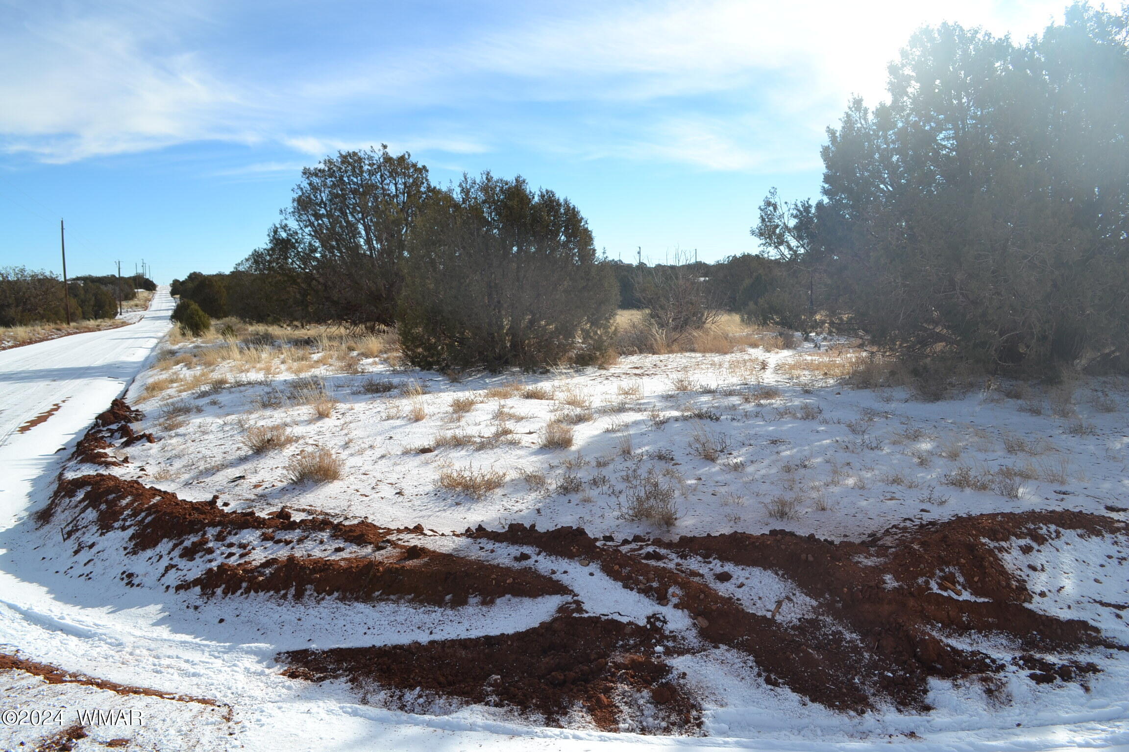 4401 Clydesdale Road Snowflake, AZ 85937 - Photo 2 of 13 a view of a yard with snow on the road