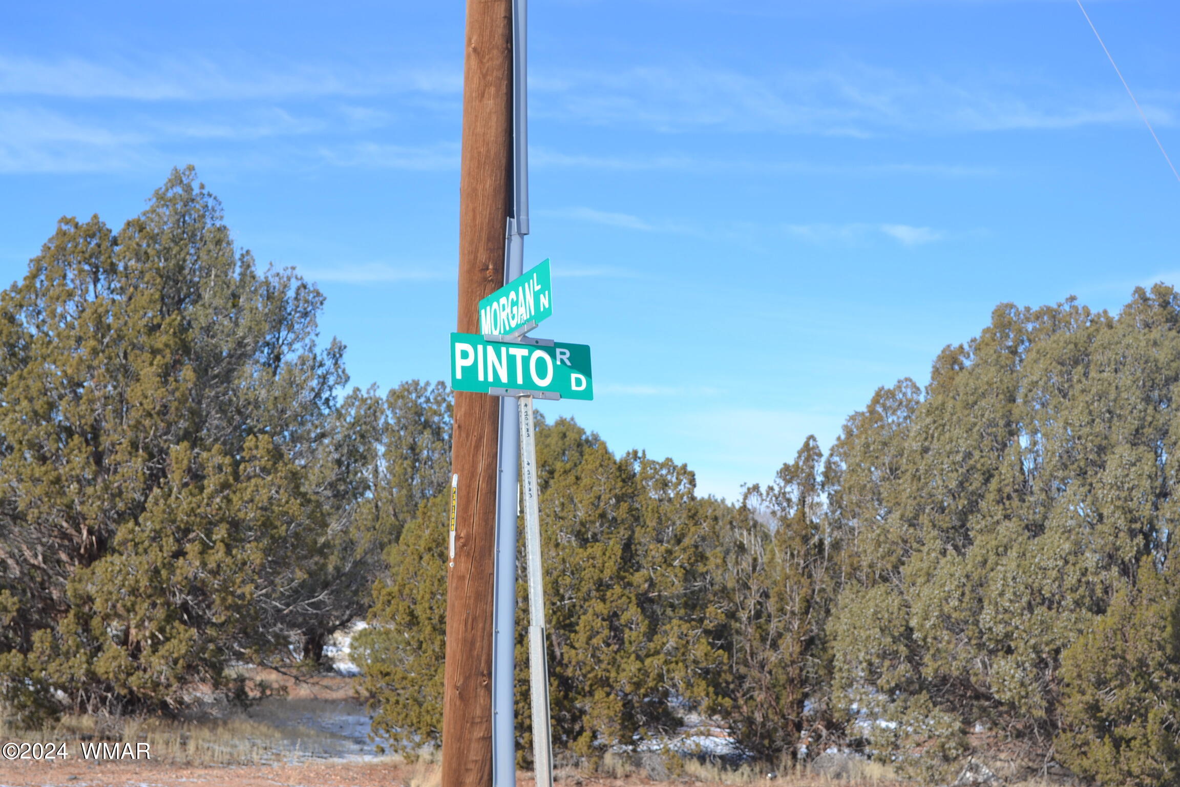 4401 Clydesdale Road Snowflake, AZ 85937 - Photo 9 of 13 a sign board on the side of a road