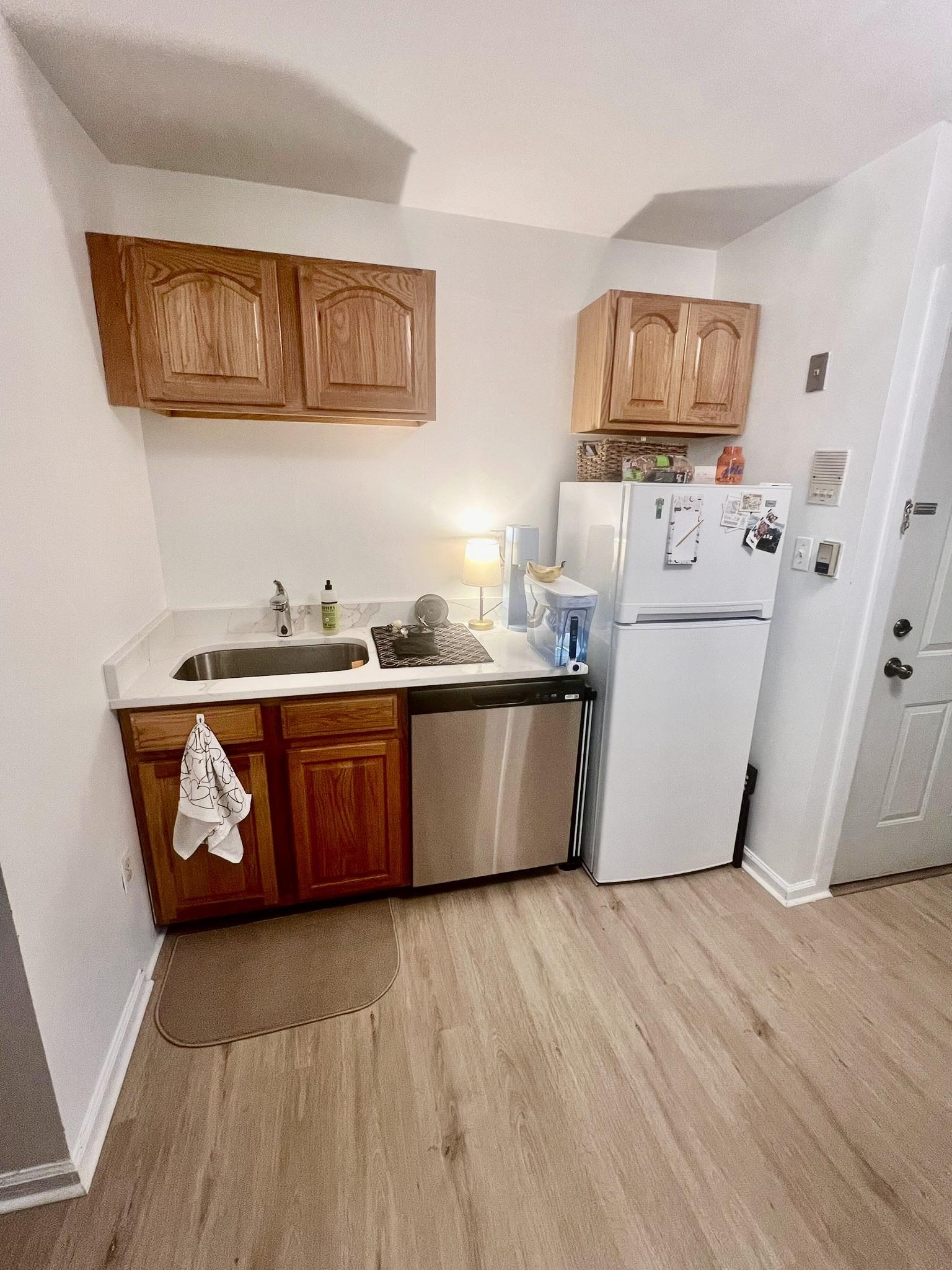 421 Adams Street, Unit 2L Hoboken, NJ 07030 - Photo 4 of 19 a room with storage and utility