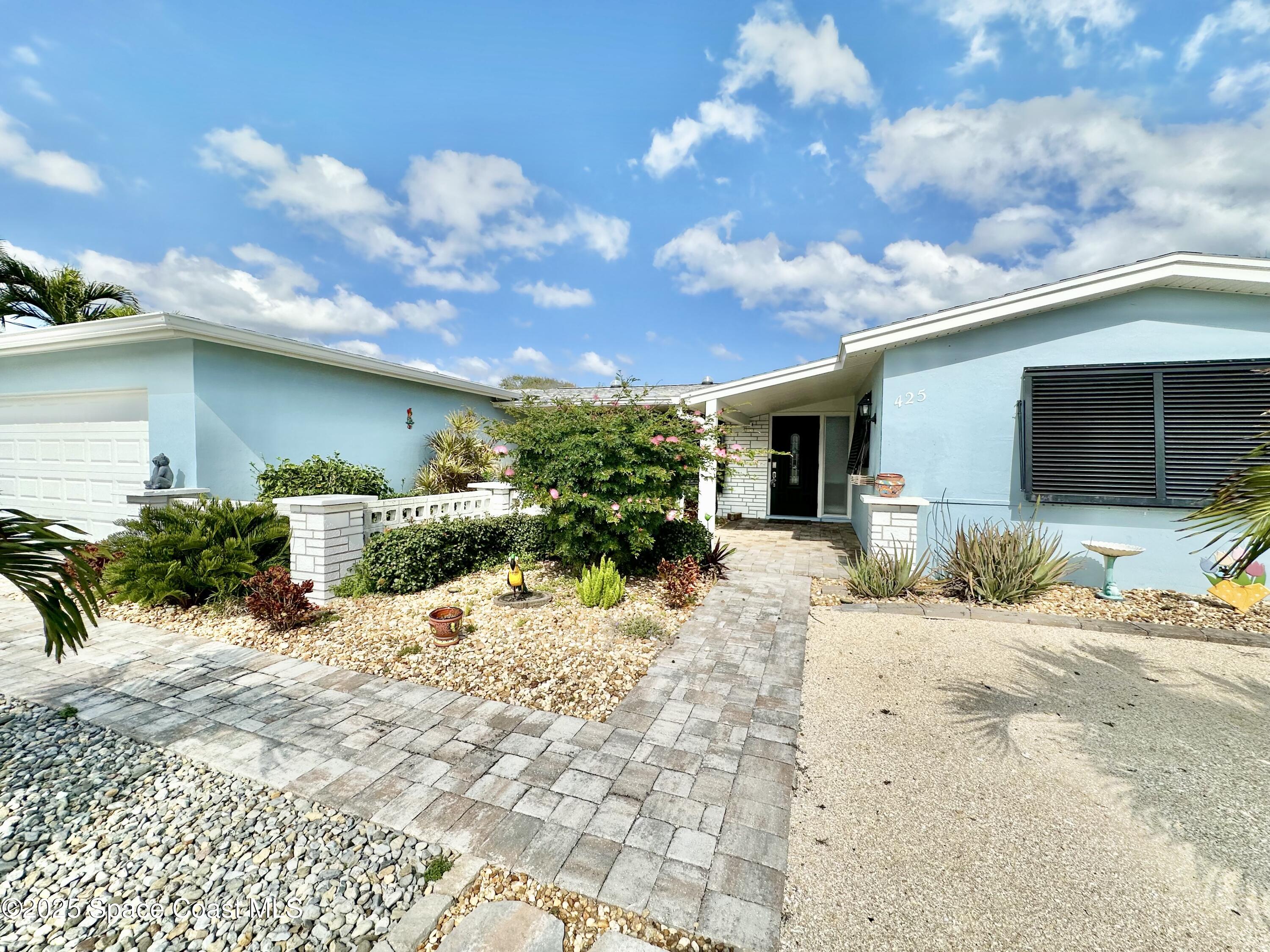 425 Penguin Drive Satellite Beach, FL 32937 - Photo 3 of 25 IMG_7696