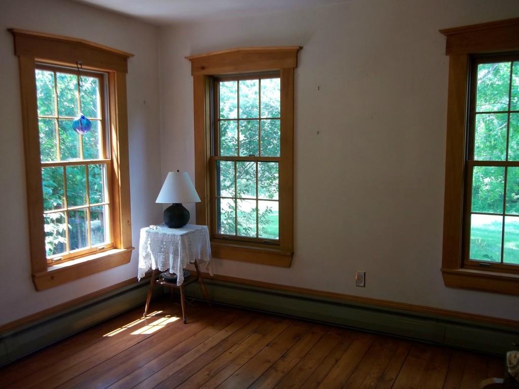 125 Nelson Road Pittston, ME 04345 - Photo 19 of 34 Living Room- Warm wood floor and...