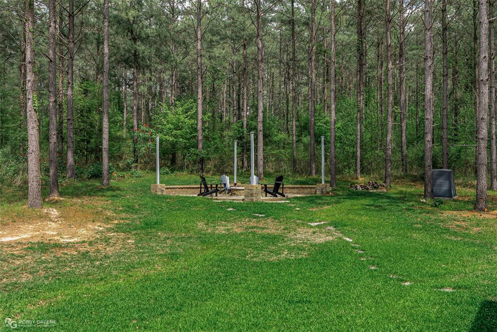 260 Circle M Road Benton, LA 71006 - Photo 32 of 35 a view of a park with a slide