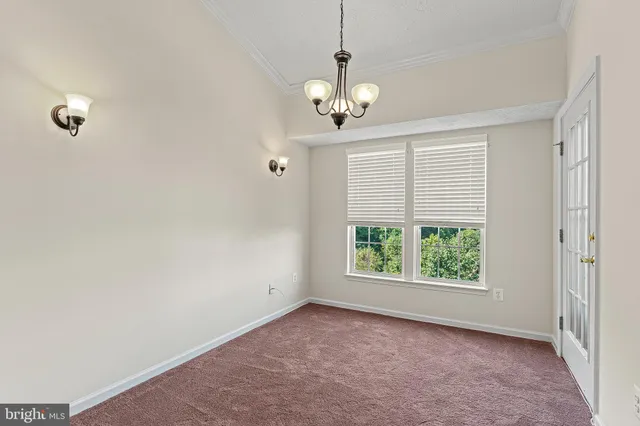 en view of an empty room with a window