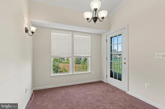 a view of a balcony with wooden floor