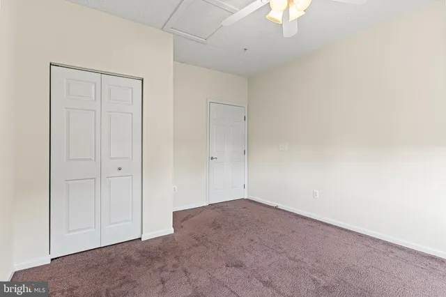 an aerial view of a house with a garden and plants