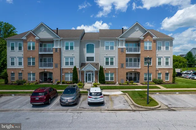 a front view of a building with street view
