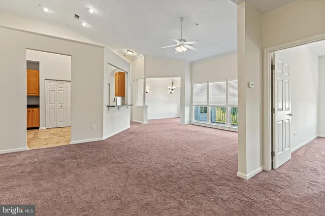 a view of livingroom and kitchen with hardwood floor