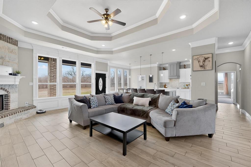 129 Altom Road Springtown, TX 76082 - Photo 5 of 40 a living room with furniture and a large window