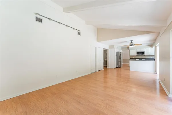 a view of an empty room with a window