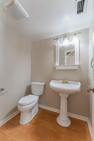 a bathroom with a shower and toilet