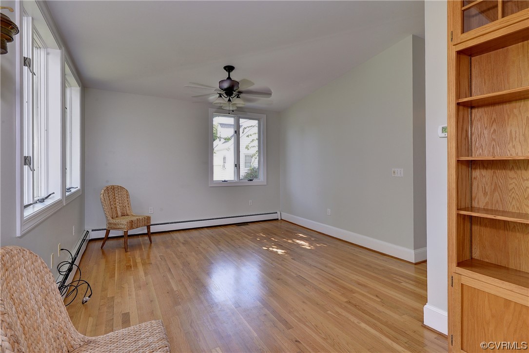 528 10th Street West Point, VA 23181 - Photo 16 of 50 a view of empty room with wooden floor and fan
