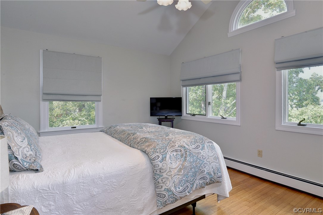 528 10th Street West Point, VA 23181 - Photo 19 of 50 a bedroom with a bed and a window