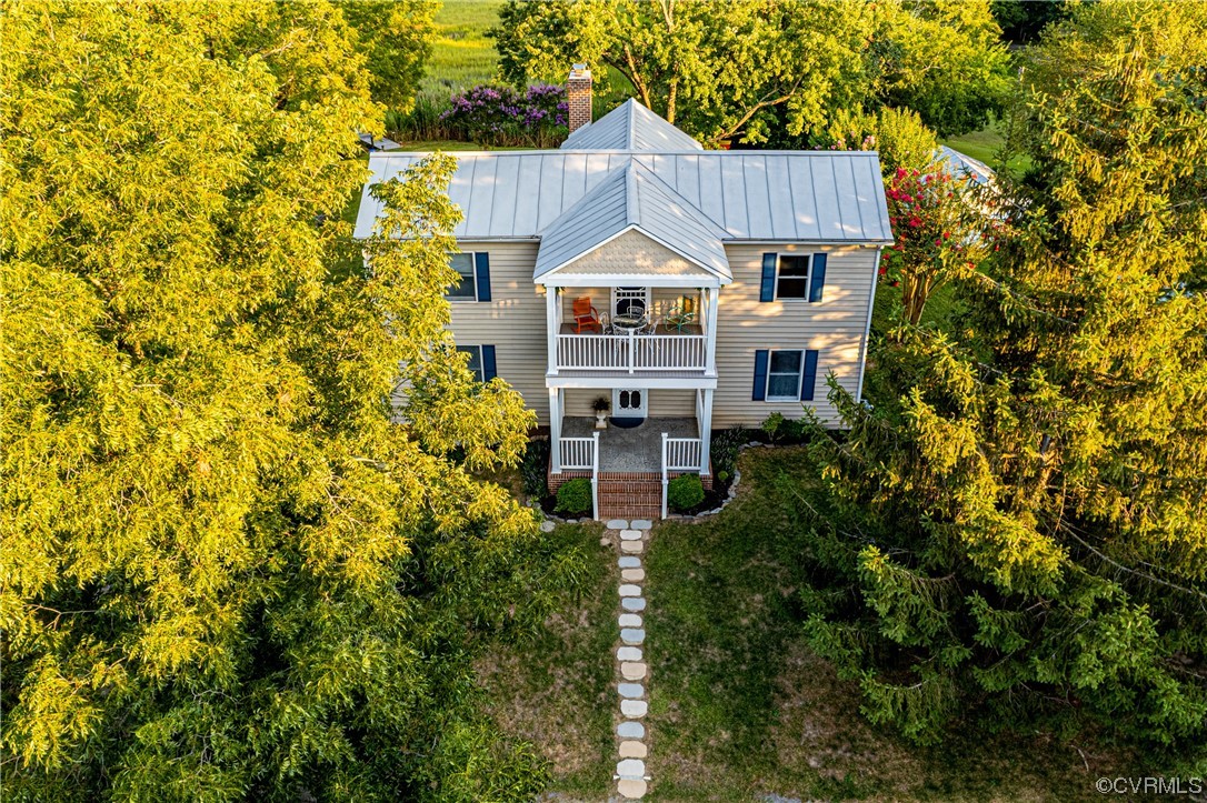 528 10th Street West Point, VA 23181 - Photo 2 of 50 an aerial view of a house with a yard table and chairs