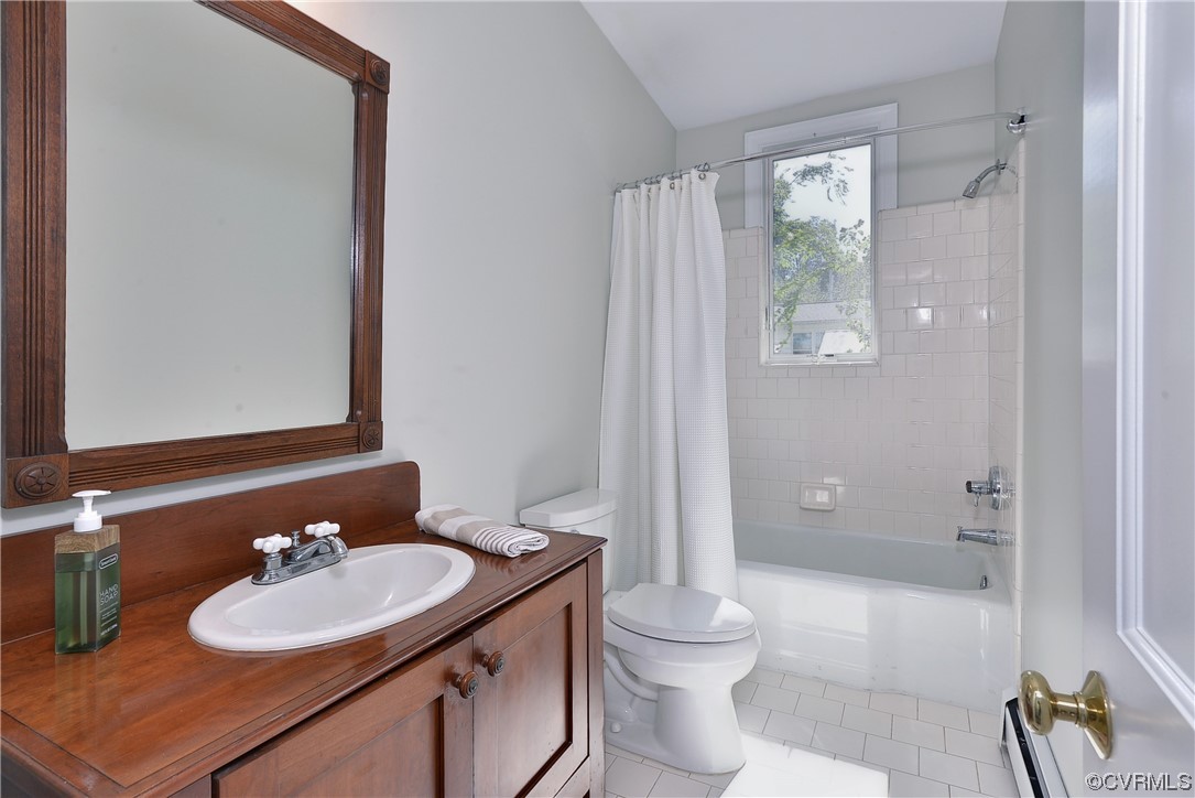 528 10th Street West Point, VA 23181 - Photo 23 of 50 a bathroom with a sink toilet vanity and shower