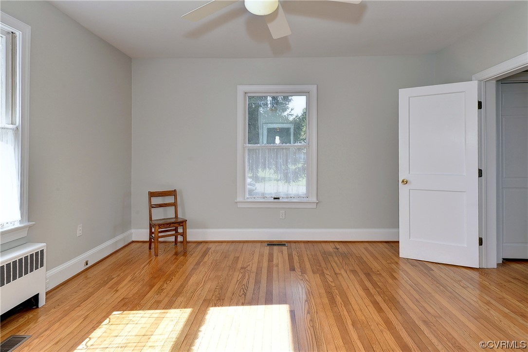 528 10th Street West Point, VA 23181 - Photo 24 of 50 wooden floor in an empty room with a window