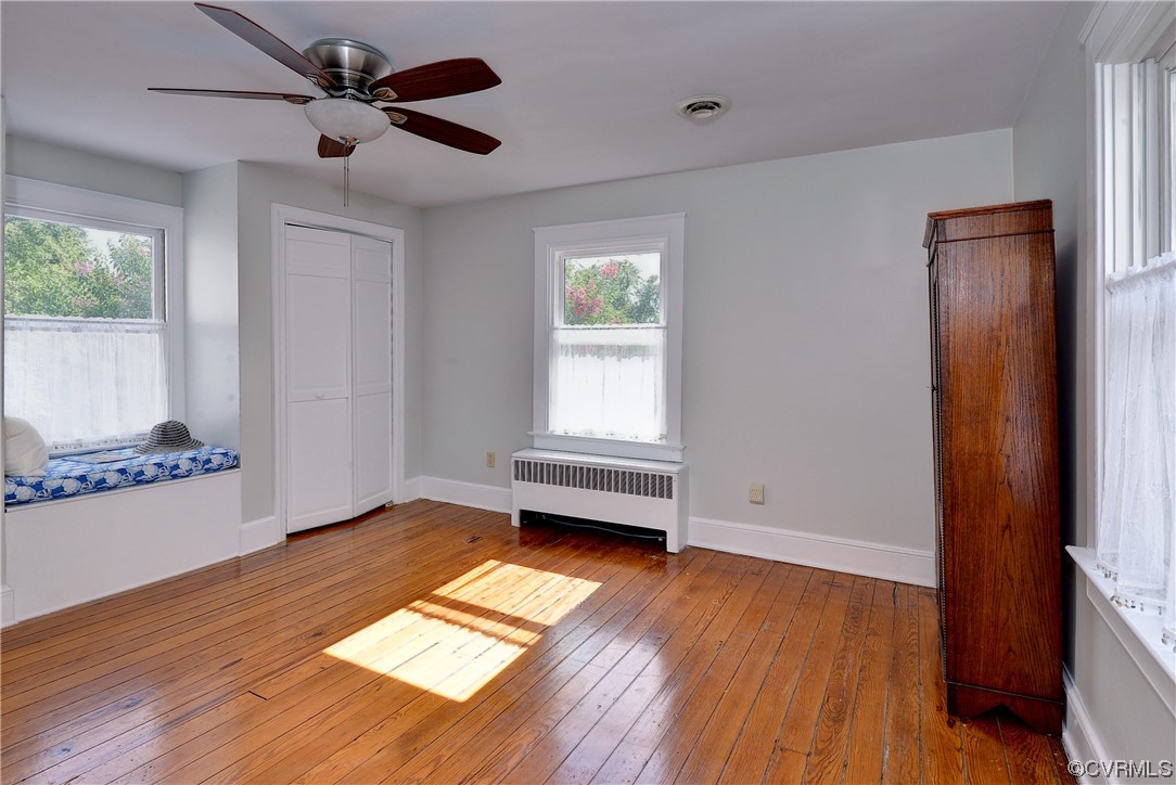 528 10th Street West Point, VA 23181 - Photo 27 of 50 a view of empty room with wooden floor and fan