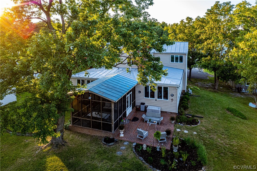 528 10th Street West Point, VA 23181 - Photo 30 of 50 a aerial view of a house with a yard table and chairs