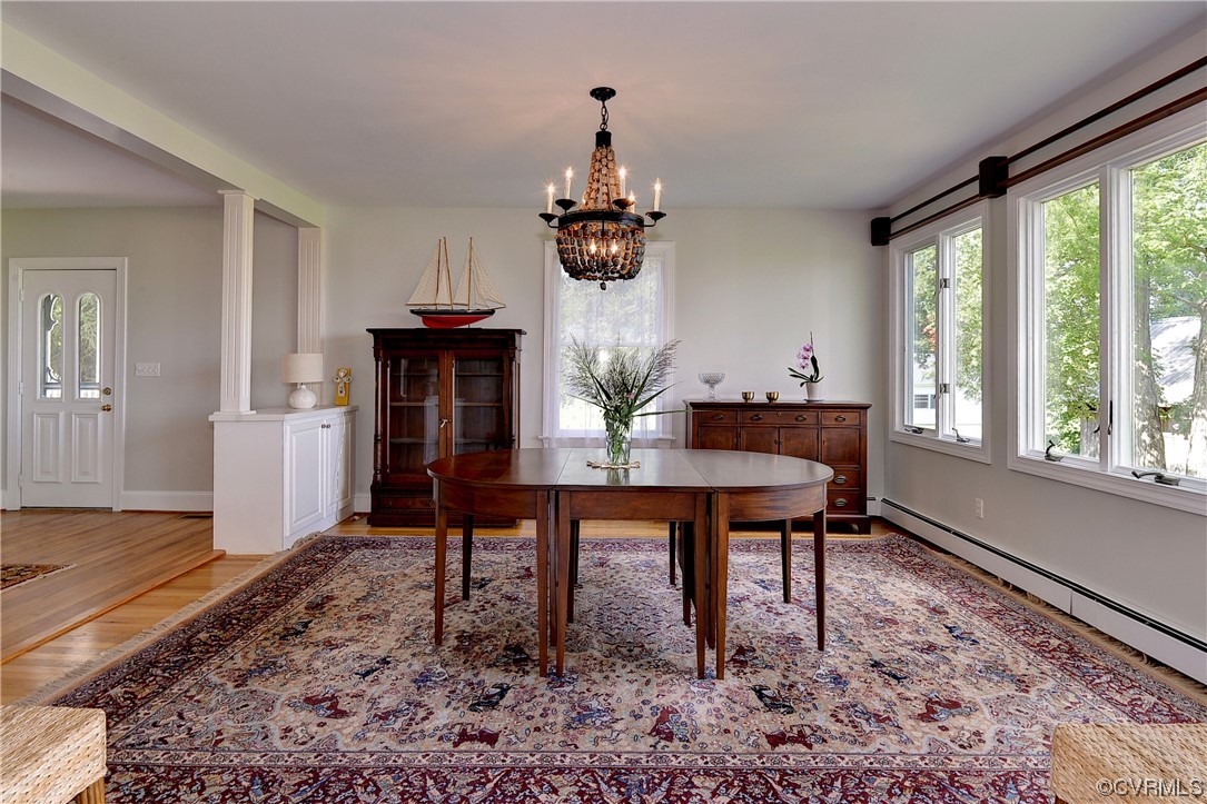 528 10th Street West Point, VA 23181 - Photo 4 of 50 a view of a dining room with furniture window and wooden floor