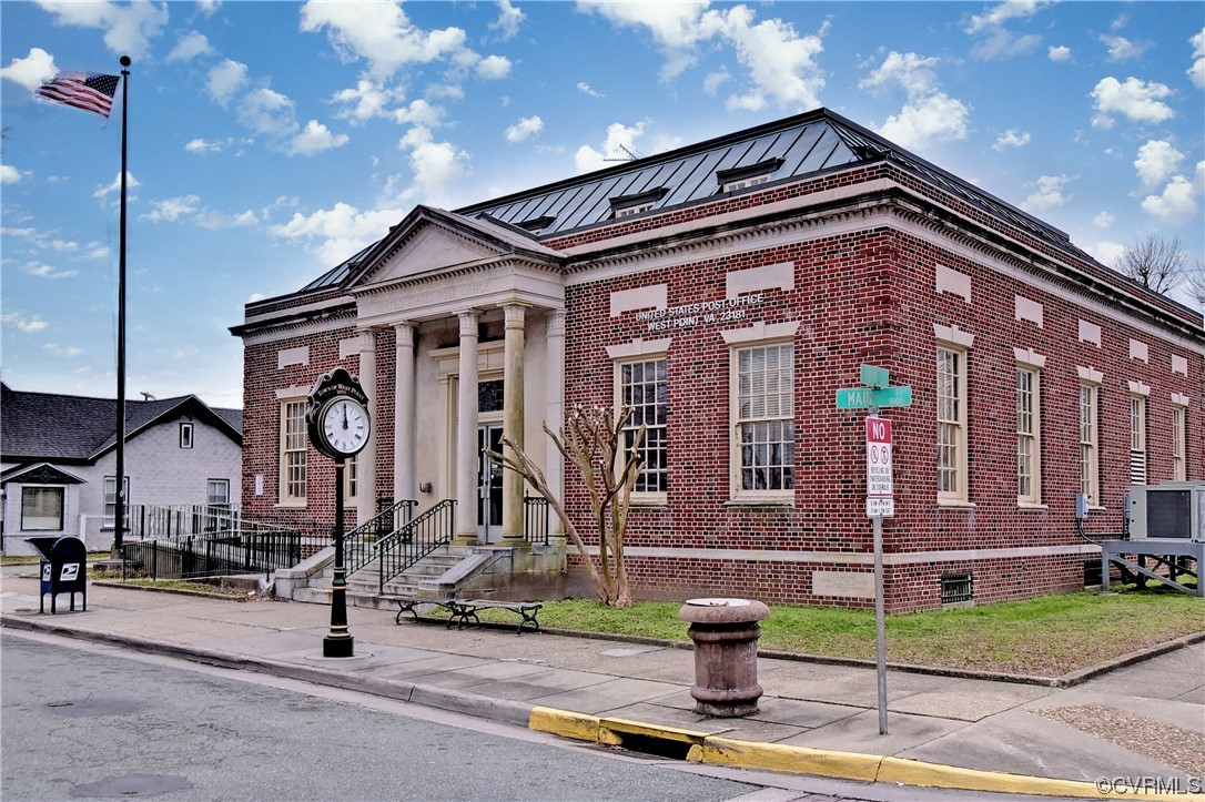 528 10th Street West Point, VA 23181 - Photo 49 of 50 a front view of a building with street view