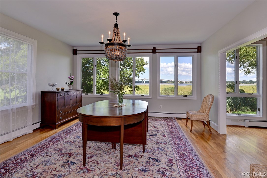 528 10th Street West Point, VA 23181 - Photo 5 of 50 a view of a dining room with furniture window and wooden floor