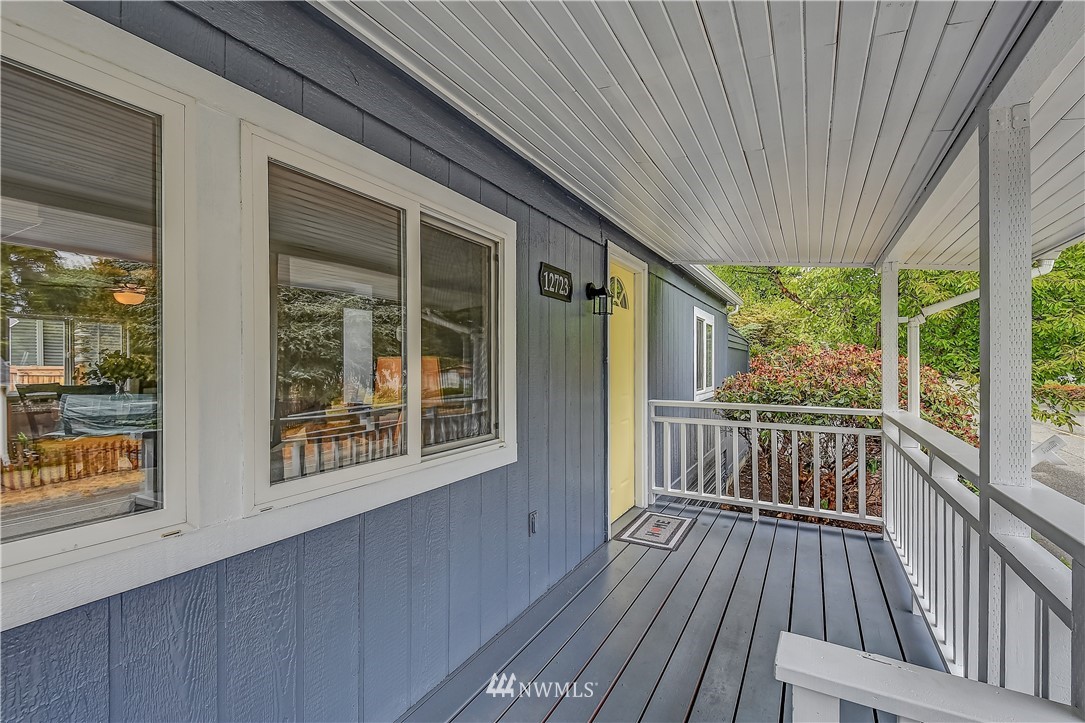 12723 Northeast 199th Street Bothell, WA 98011 - Photo 2 of 34 a view of a two chairs in the balcony
