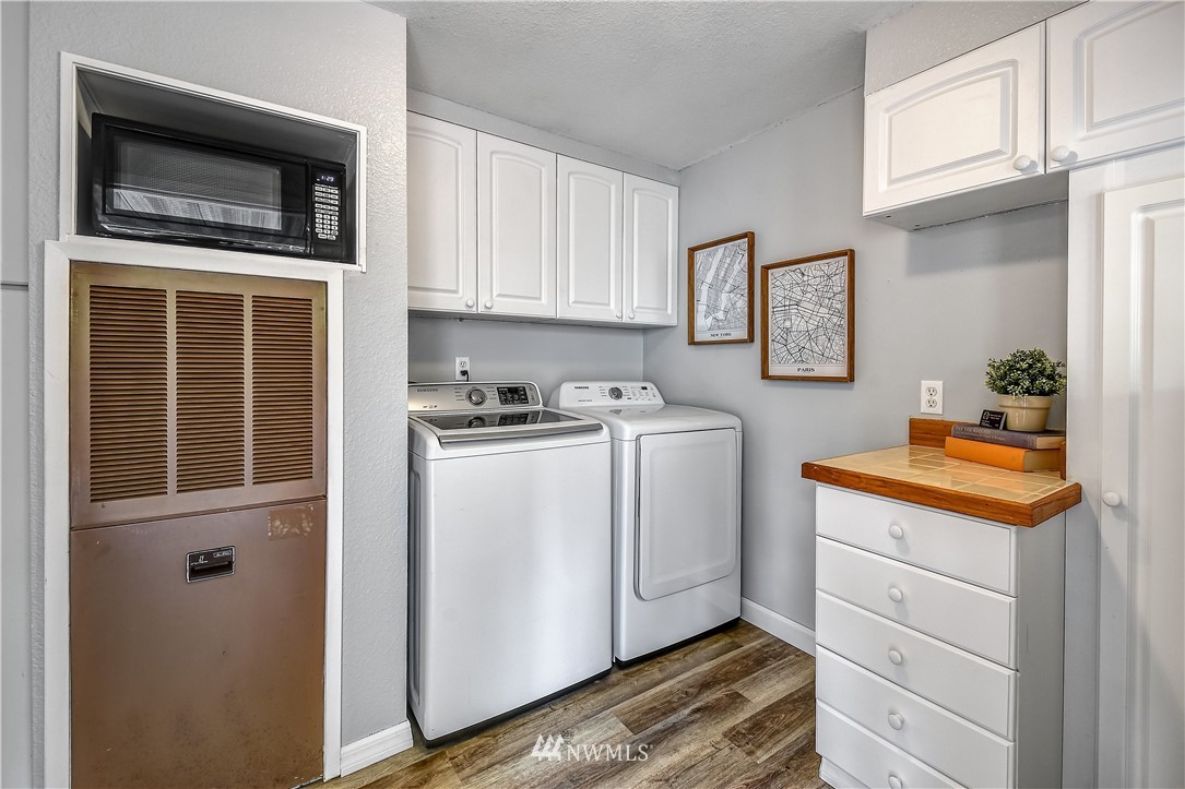 12723 Northeast 199th Street Bothell, WA 98011 - Photo 16 of 34 a room with storage and utility