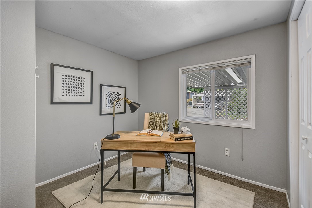 12723 Northeast 199th Street Bothell, WA 98011 - Photo 26 of 34 a view of a workspace with furniture
