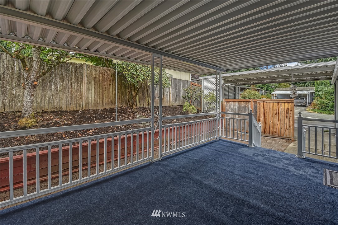12723 Northeast 199th Street Bothell, WA 98011 - Photo 29 of 34 a view of a porch with wooden floor
