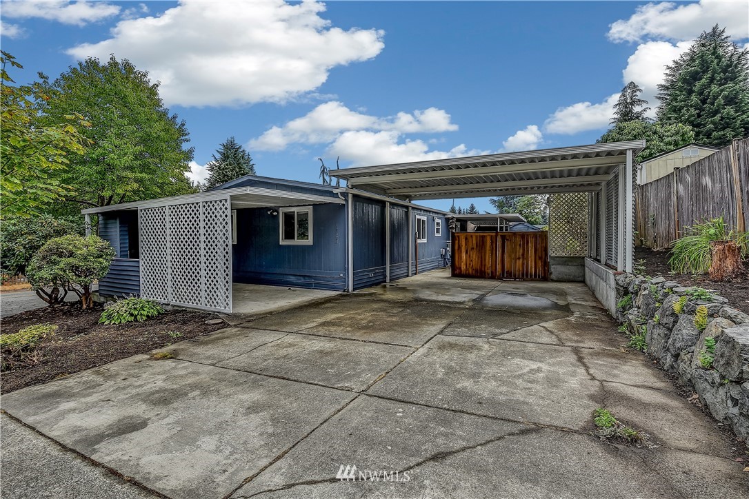 12723 Northeast 199th Street Bothell, WA 98011 - Photo 34 of 34 a view of a house with backyard and garden