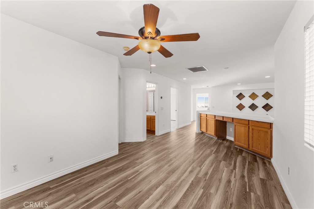 9749 Orange Street Rancho Cucamonga, CA 91737 - Photo 20 of 38 a view of a room with wooden floor fan and window