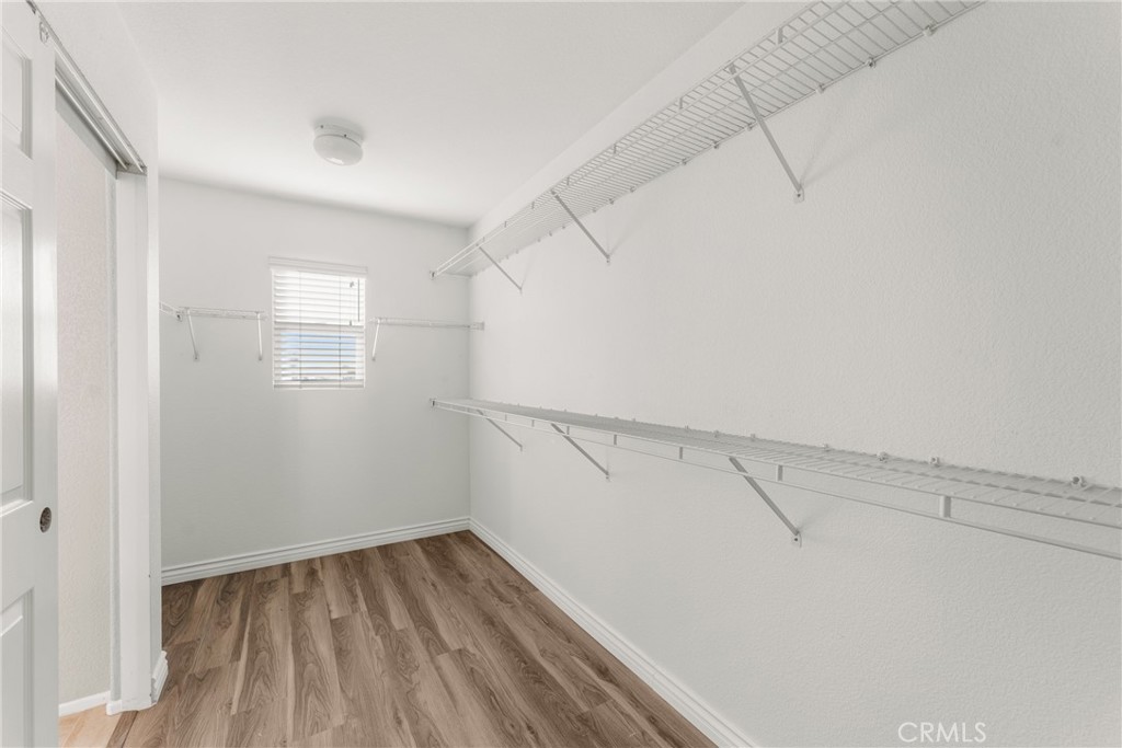 9749 Orange Street Rancho Cucamonga, CA 91737 - Photo 27 of 38 a view of a room with racks on the wall