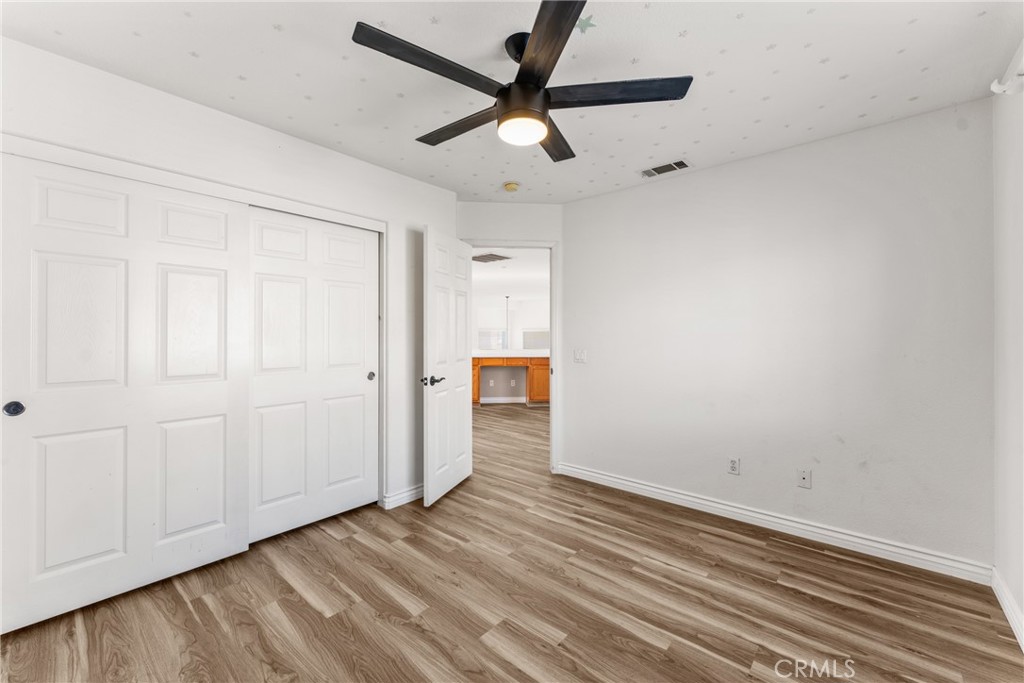 9749 Orange Street Rancho Cucamonga, CA 91737 - Photo 28 of 38 wooden floor in an empty room