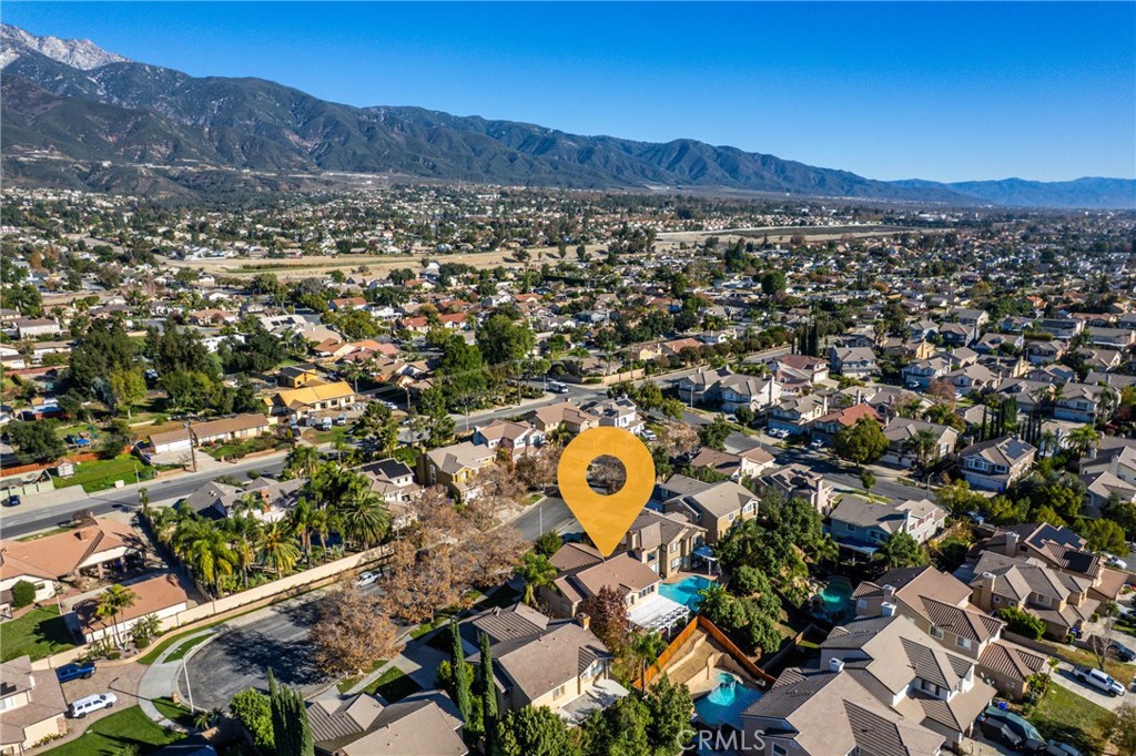 9749 Orange Street Rancho Cucamonga, CA 91737 - Photo 36 of 38 an aerial view of residential house with an outdoor space and seating